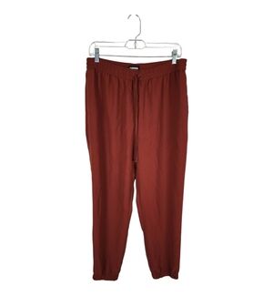 Express ankle-length casual mid-rise pants in a rich rust color Size Medium